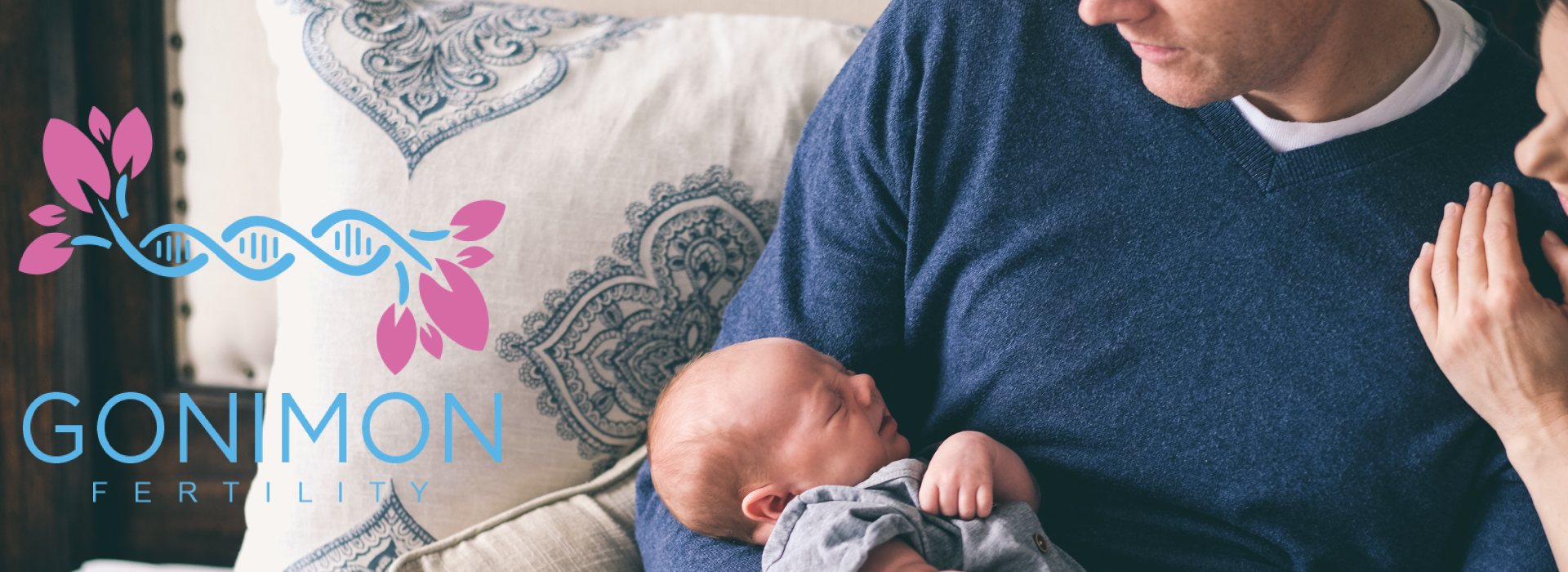 gonimon logo man and woman holding newborn